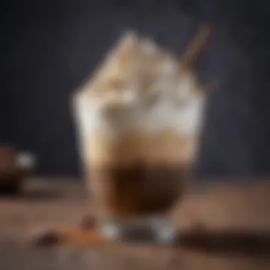 Close-up of a Mudslide cocktail garnished with whipped cream and chocolate shavings