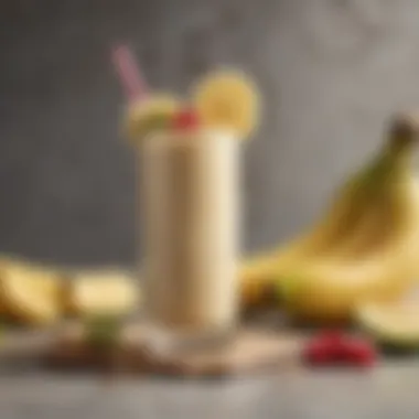 A vibrant glass of banana smoothie garnished with fruits.