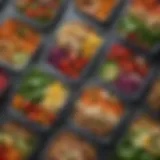 Colorful array of meal prep containers filled with vibrant salads and grains