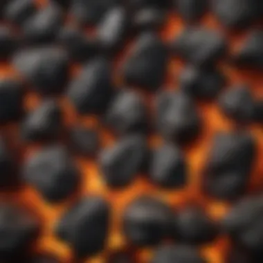 Intense Heat from Charcoal Embers Close-up of glowing charcoal embers ready for grilling