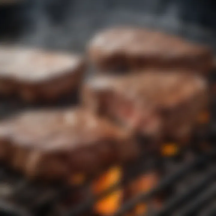 Charcoal grill with T-bone steaks sizzling on the grates