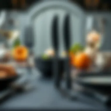 Matte black flatware with a backdrop of elegant dinnerware