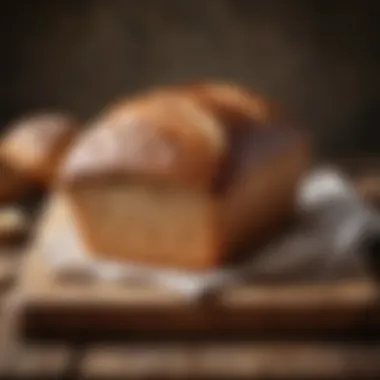 A loaf of freshly baked gluten-free bread resting on a wooden cutting board with a rustic background.