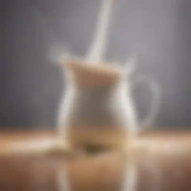 Mastering Milk Frothing Techniques A steaming pitcher of milk ready for frothing