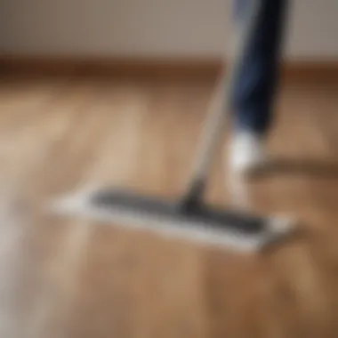 A microfiber mop gliding over a laminate floor