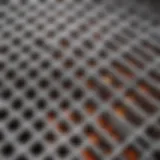 Close-up view of a stainless steel grill grate showcasing its texture