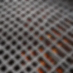 Close-up view of a stainless steel grill grate showcasing its texture