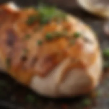 Close-up of a seasoned chicken breast garnished with herbs and spices, showcasing texture and color.