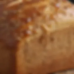 A close-up view of honey wheat bread showcasing its golden crust and fluffy texture.