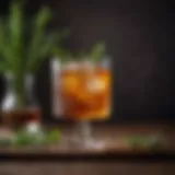 A beautifully crafted sweet whiskey cocktail garnished with fresh herbs