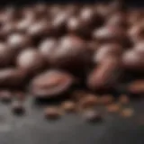 A close-up of rich dark chocolate with cacao beans beside it.