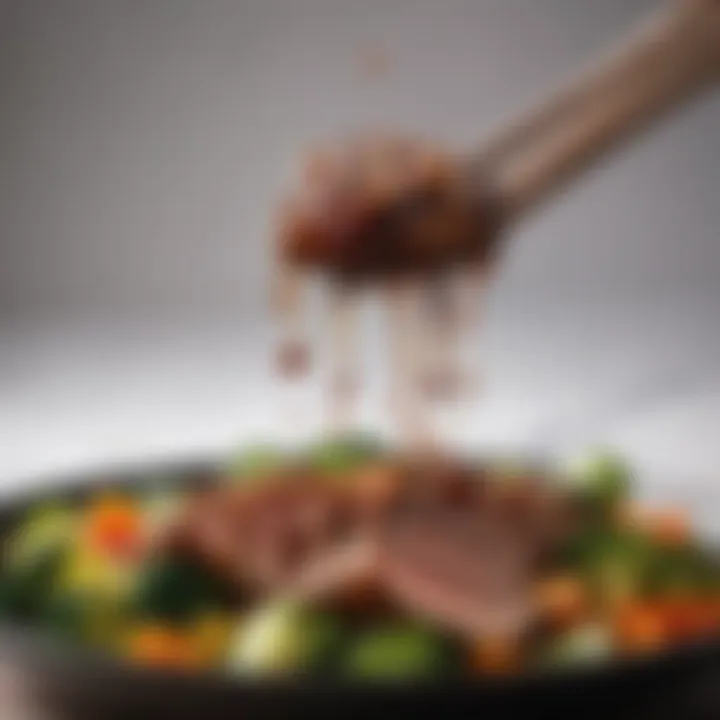 A vibrant teriyaki sauce being drizzled over grilled meats and vegetables.