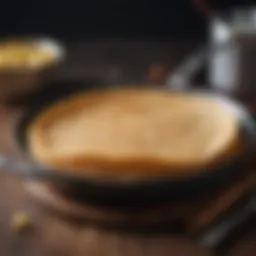 A beautifully crafted crepe pan showcasing its non-stick surface.