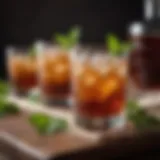 An elegant glass of Sweet Tea Bourbon Cocktail garnished with a sprig of mint