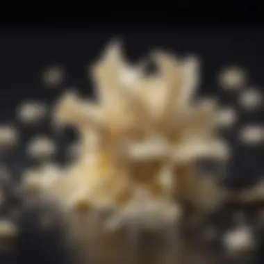 Close-up of delicate white chocolate shavings on a dark background