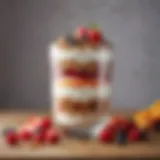 A beautifully layered yogurt parfait showcasing vibrant fruits and granola.