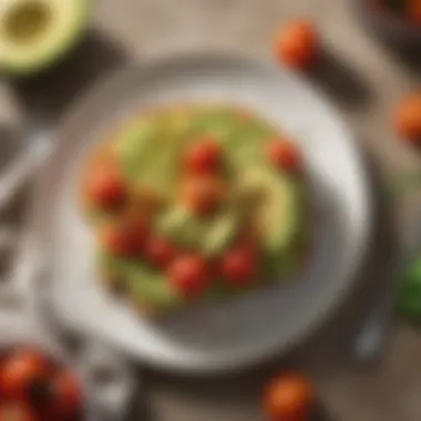 A plate of whole grain toast topped with avocado and cherry tomatoes