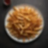 Golden brown air-fried fries on a plate