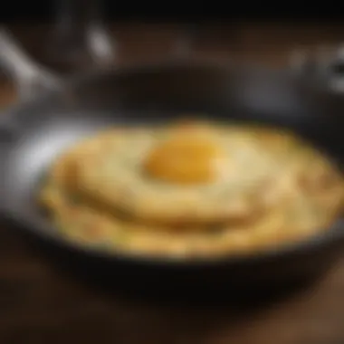 A close-up of a perfectly cooked omelette sliding effortlessly from a nonstick skillet