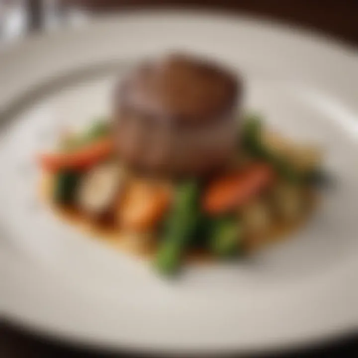 An elegantly plated filet mignon dish with vegetables