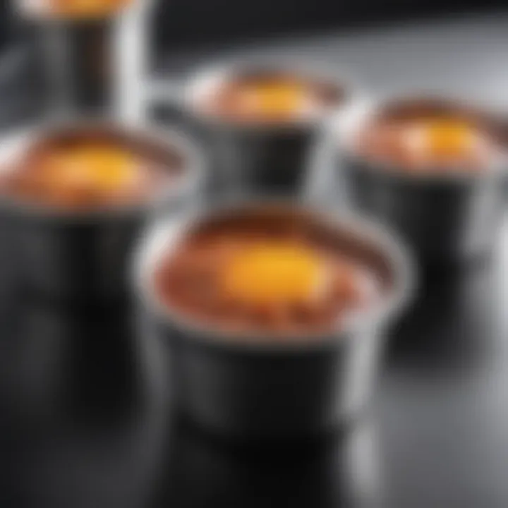 Stainless steel sauce cups showcasing modern kitchen style