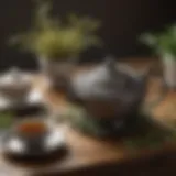 An intricate small metal tea pot resting on a wooden table, surrounded by tea leaves and fine china cups.