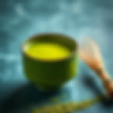 Matcha Tea Experience A vibrant bowl of matcha tea with a whisk beside it