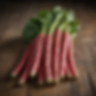 Fresh rhubarb stalks on a wooden table